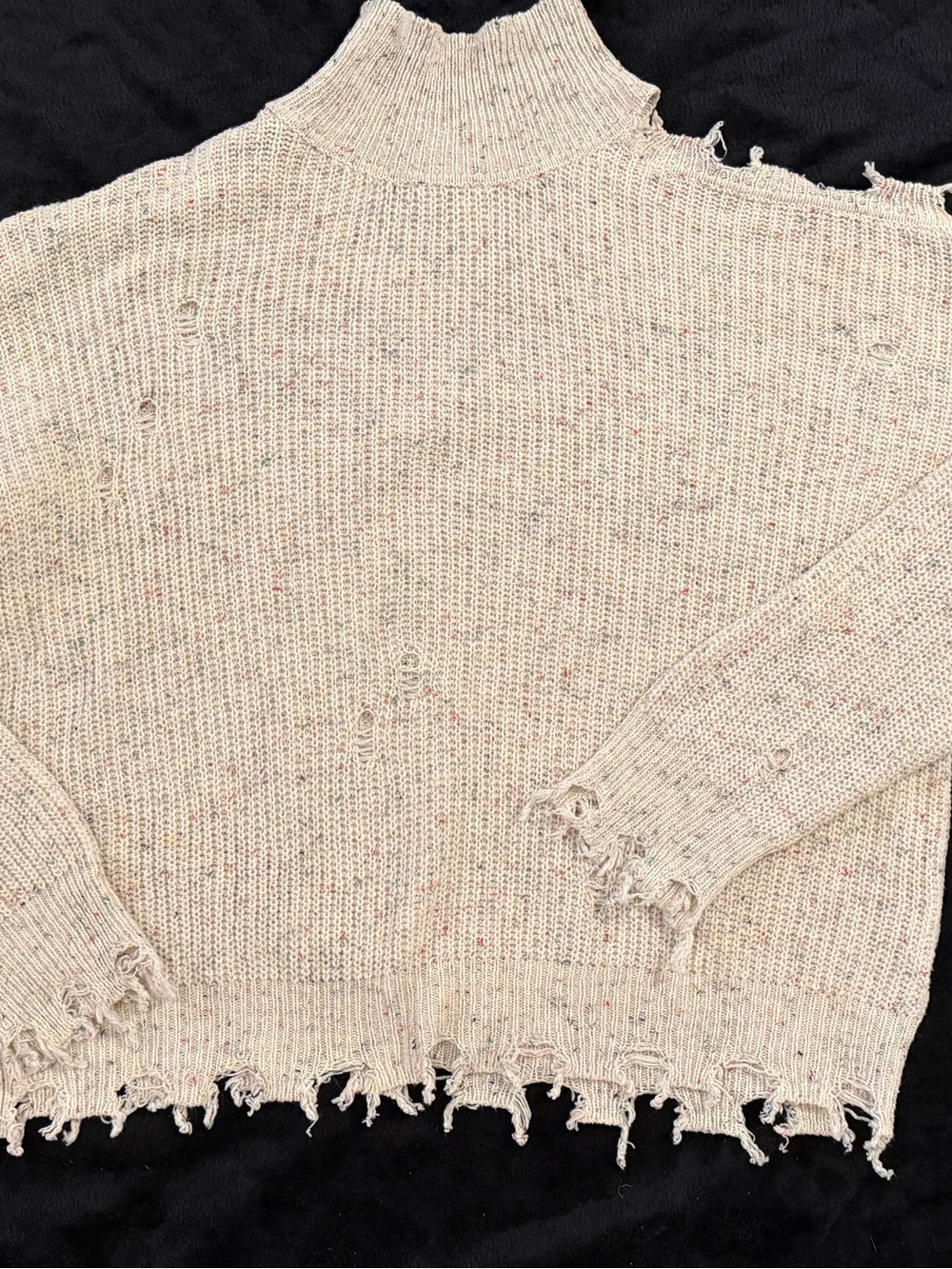 Cozy Cream Distressed Turtleneck Sweater